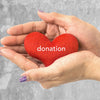 hand holding heart - donation