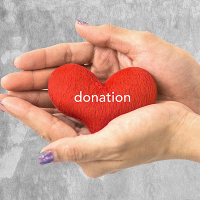 hand holding heart - donation